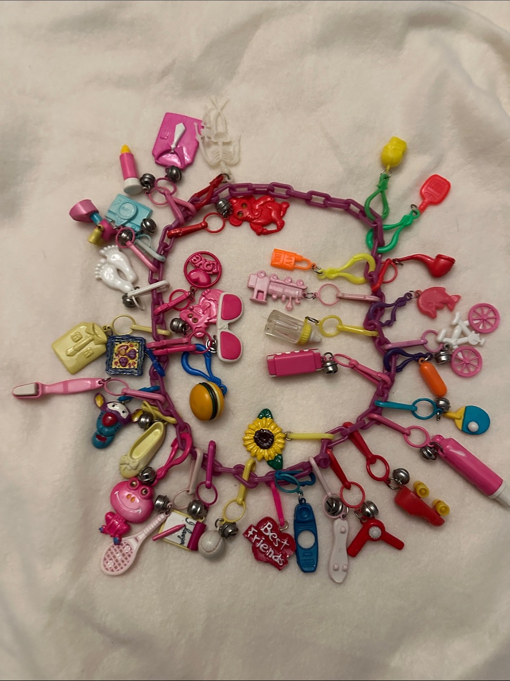 Vintage plastic charm necklace with 38 charms